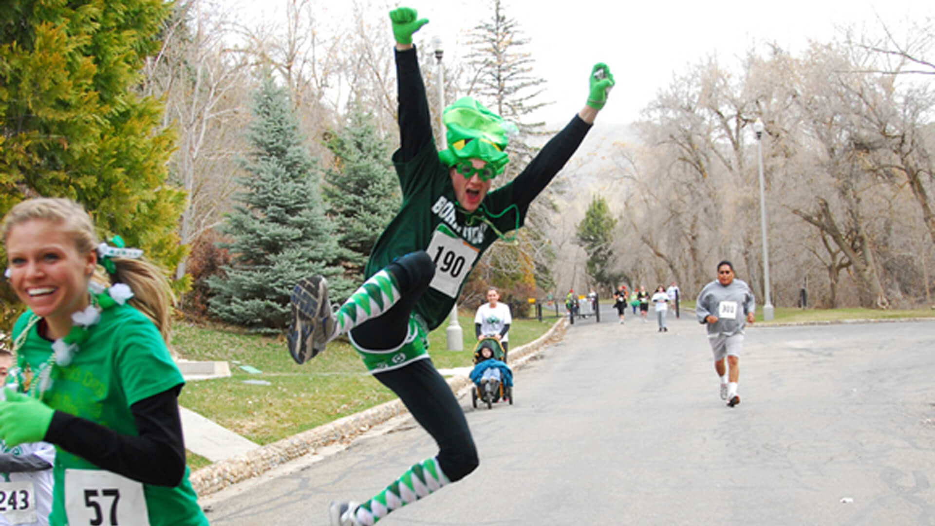 marathon runner wearing green jumps